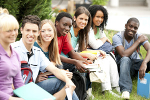Group of teenage students enjoying outside.